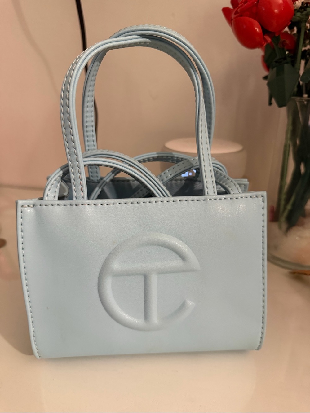 Telfar Mini Shopping Bag in Light Blue. Height 4 3/4", Width 6 5/8", Depth 3", S